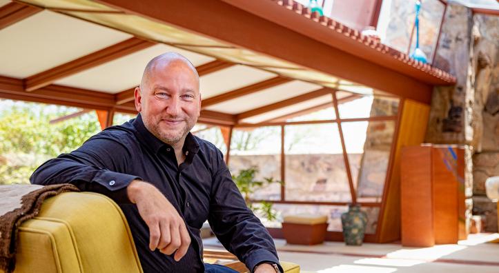 Joseph Specter is pictured in the living room of Frank Lloyd Wright's Taliesin West, in Scottsdale.