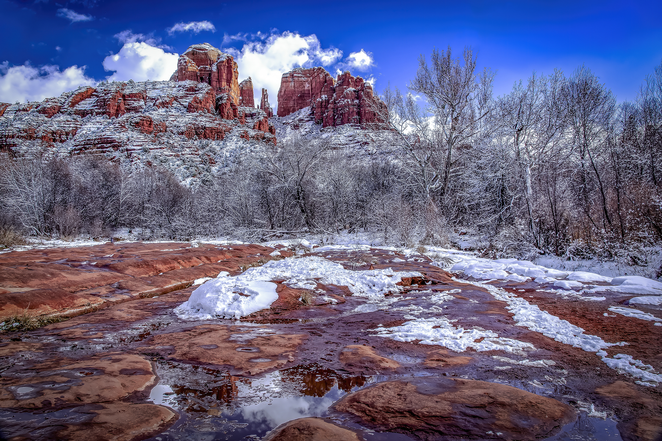Photo by Susie Reed  |  I took this photo of Cathedral Rock after an unusually heavy snow. Some of the puddles were icy. Shooting this was a slippery, cold, wonderful adventure.