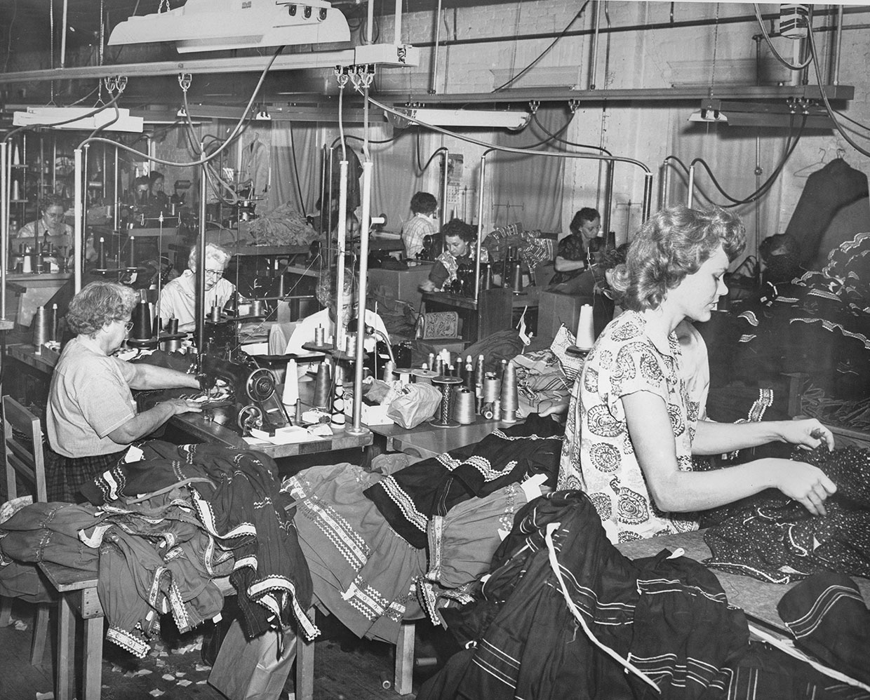 Employees work on dresses at the company’s Prescott facility. |  ARIZONA STATE LIBRARY, ARCHIVES AND PUBLIC RECORDS