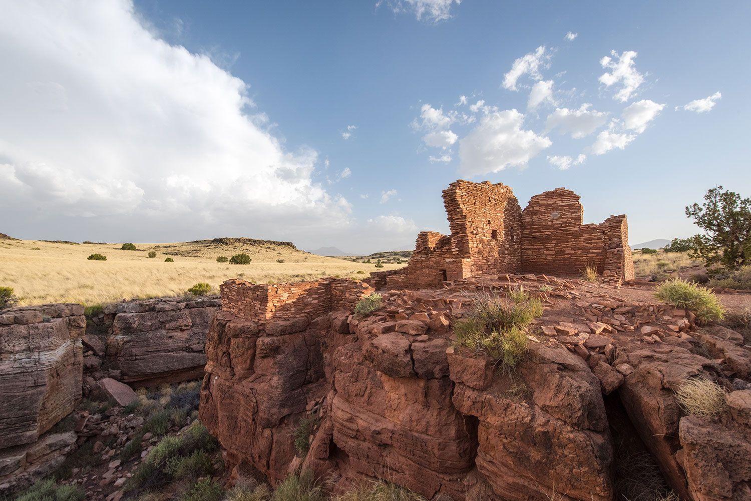 Lomaki Pueblo rises from the sparse landscape of Wupatki National Monument, near Flagstaff. By John Fink