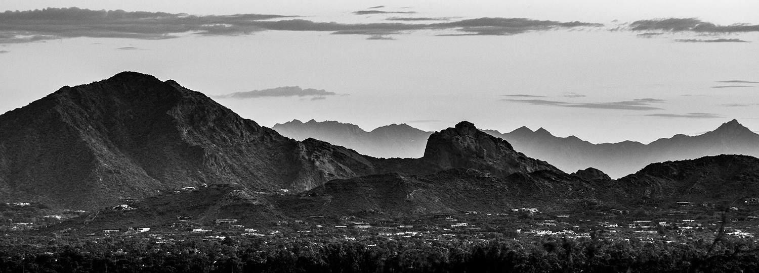 Smog collects behind Phoenix’s Camelback Mountain in a view from the McDowell Mountains. By Nathan Schwimmer