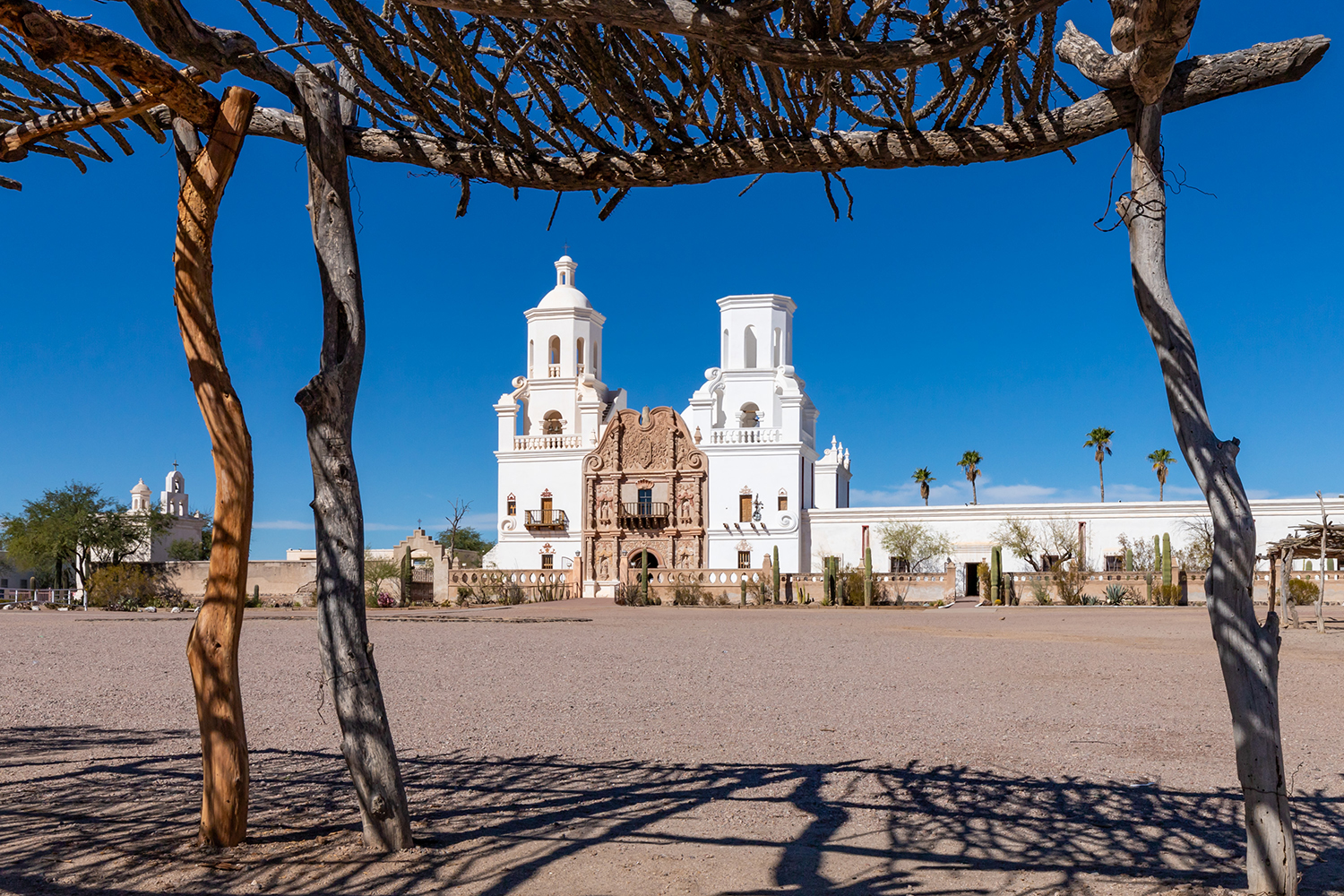 The historic Mission San Xavier del Bac rises from the desert southwest of Tucson. Photograph by Mark Navarro