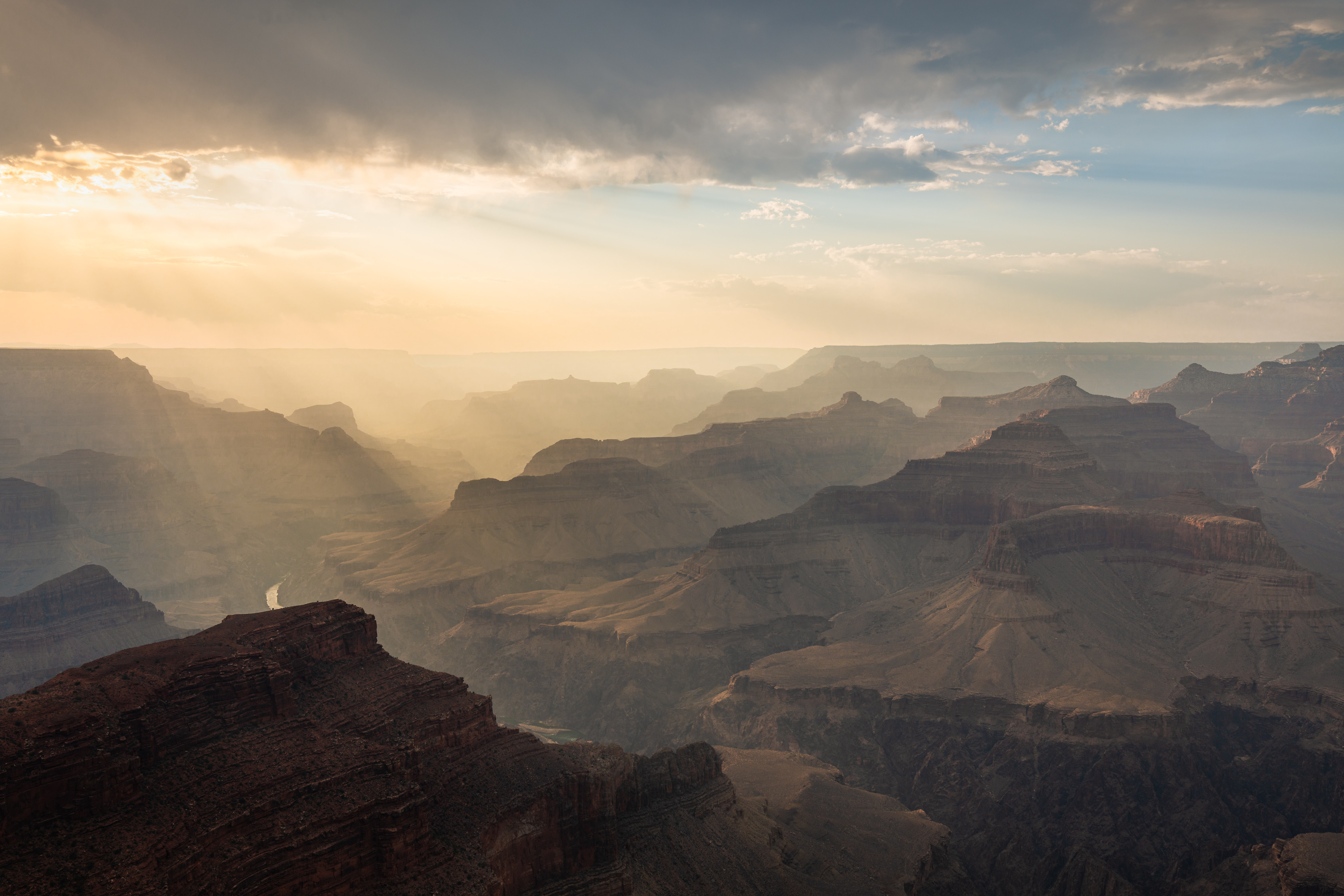 Smoke from the Dragon Bravo creates sunbeams just before sunset at the Grand Canyon. By Matt Soeffner
