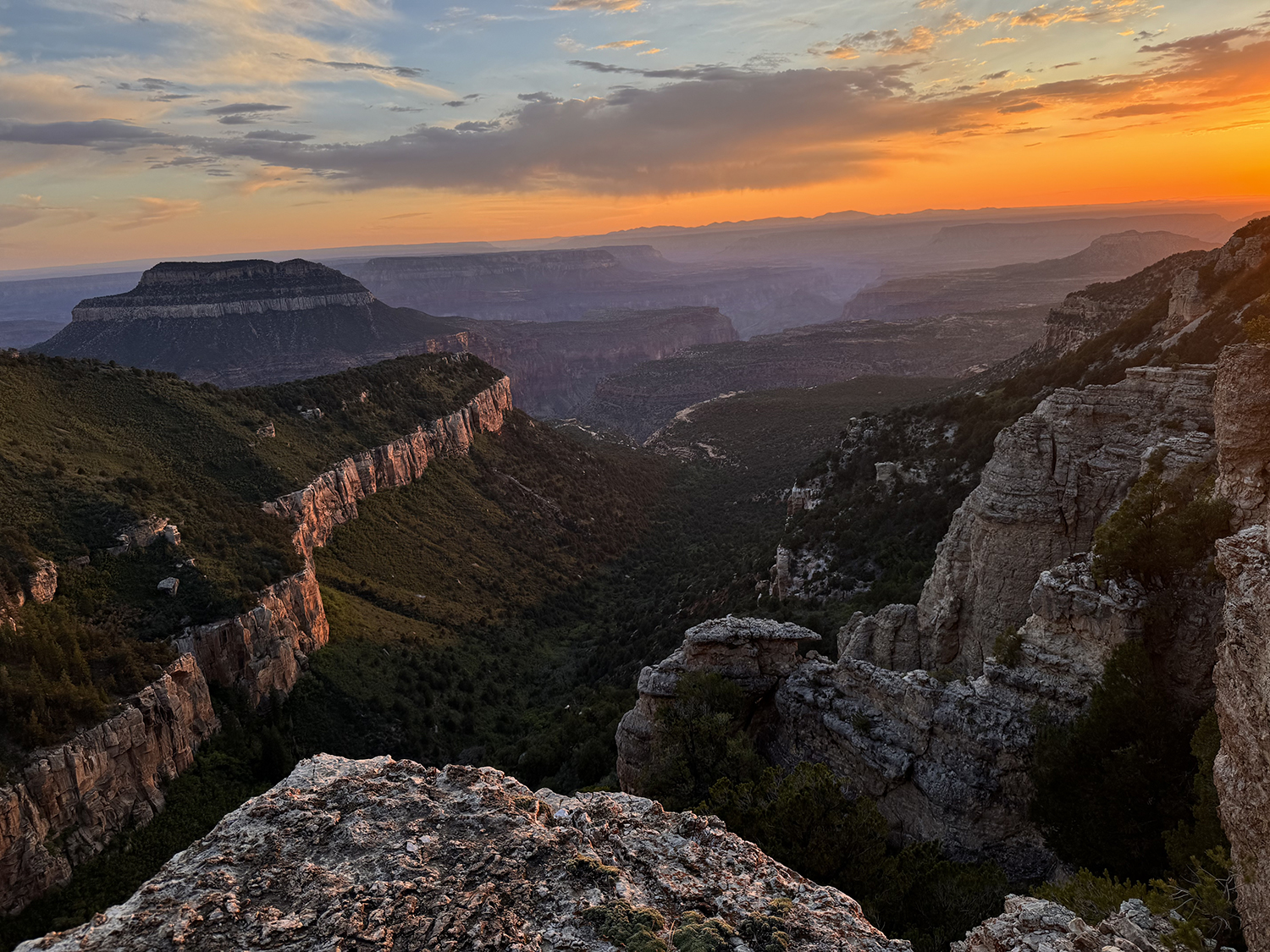 Locust Point, on the Grand Canyon's North Rim, offers a sunset view of Steamboat Mountain. By Steve Coleman