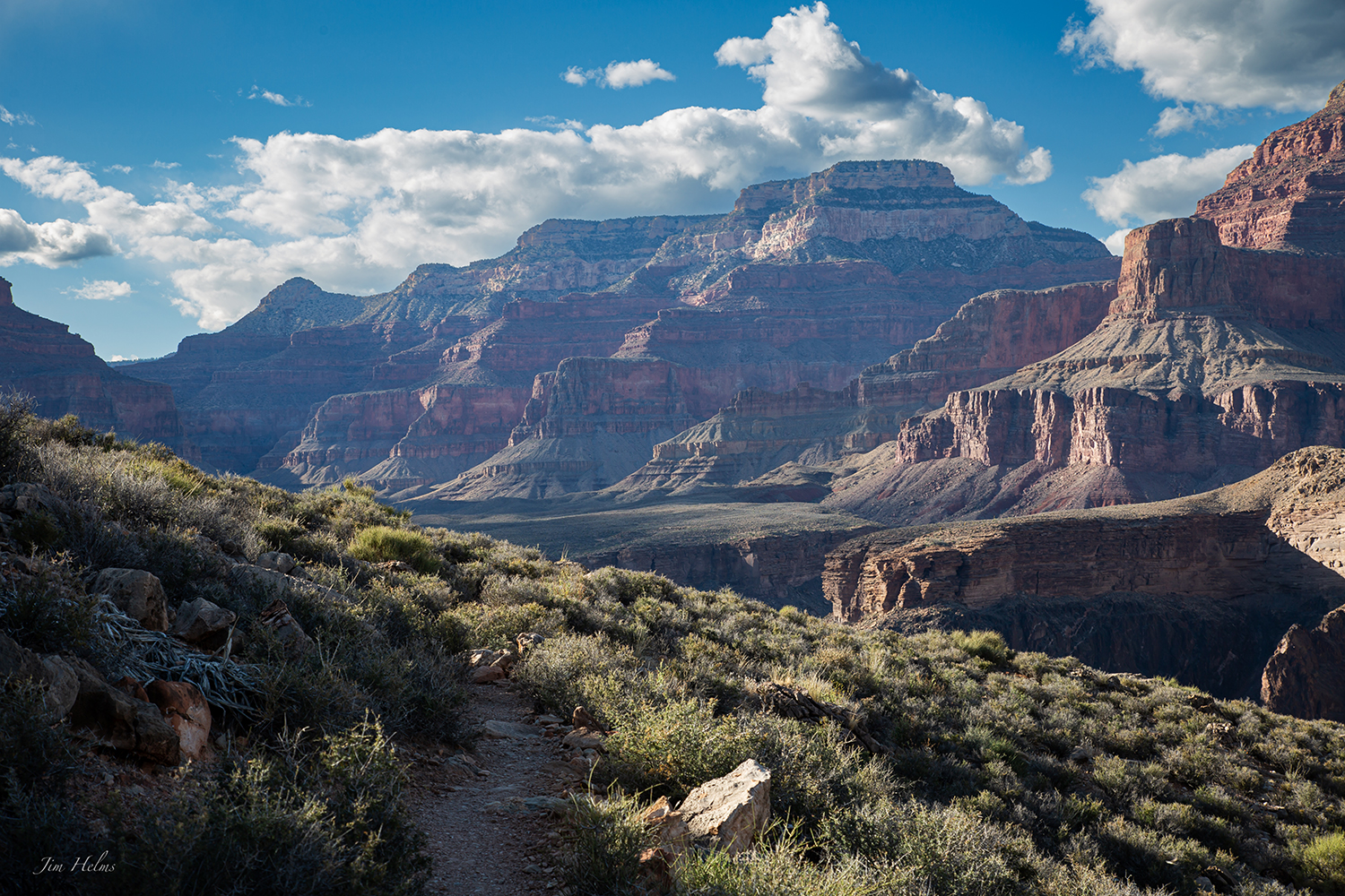 The buttes of the Grand Canyon loom in a view from the Tonto Trail. By Jim Helms