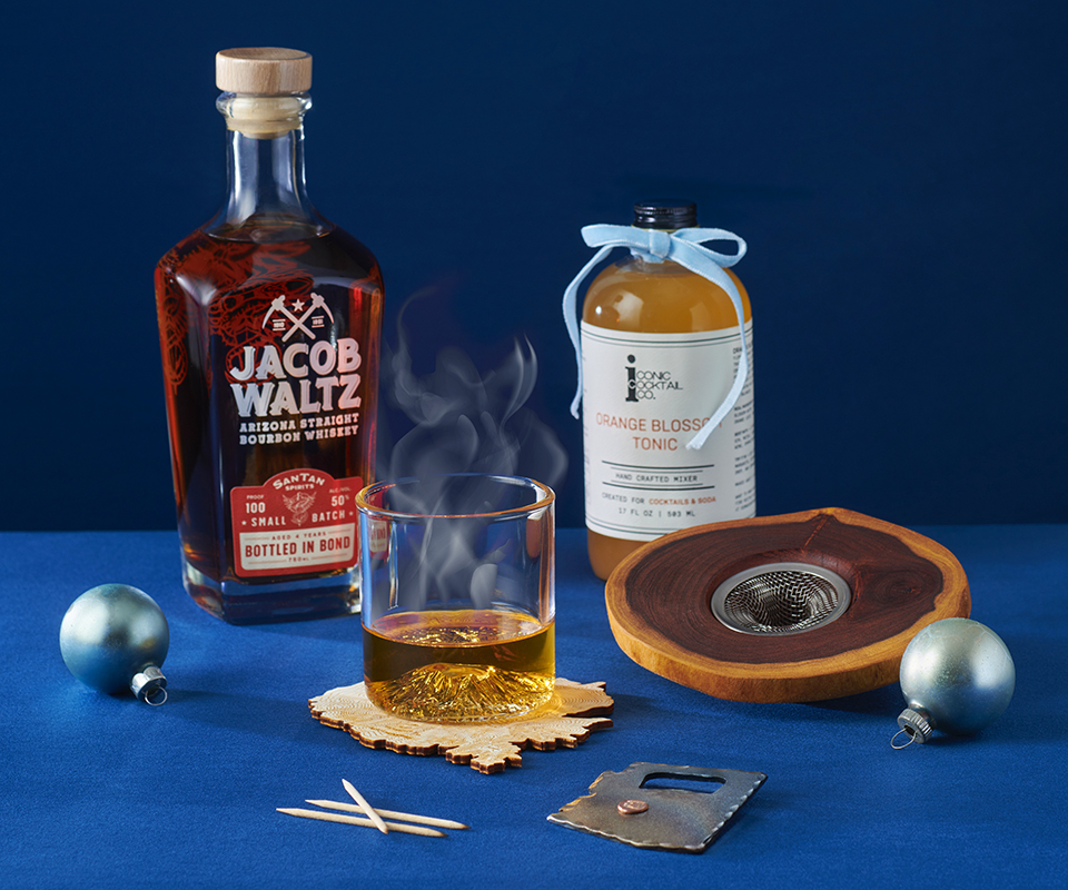 Christmas Spirits gifts include whiskry, tonic, toothpicks, coasters and a cocktail smoker. By Rob Ballard