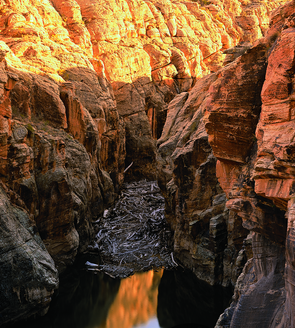 Prodigious spring snowmelt has cut a 200- to 400-foot-deep cleft in the upper part of the canyon, narrowing the creek and causing debris buildups. | Nick Berezenko