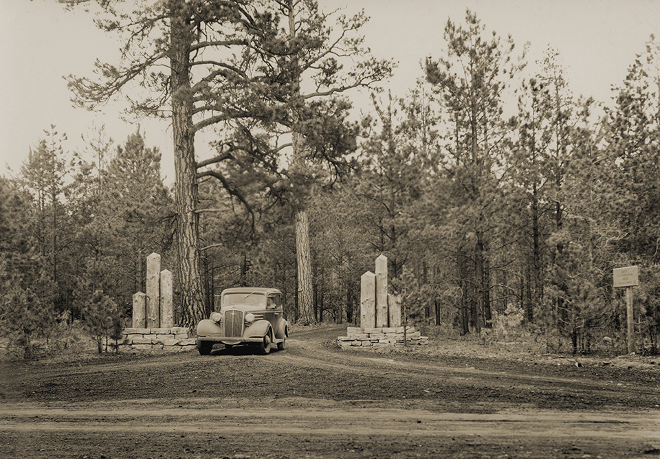 A car pulls out of a U.S. Forest Service campground near Greer, in the White Mountains of Eastern Arizona, in the 1930s. That decade, an Arizona Highways writer cited the mountains’ beauty and wildlife as reasons to establish a national park there. | Round Valley Public Library,  Apache County Library District