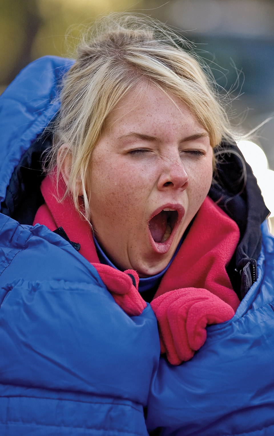Lexi Hofmann yawns, half-asleep and shivering. By Peter Schwepker