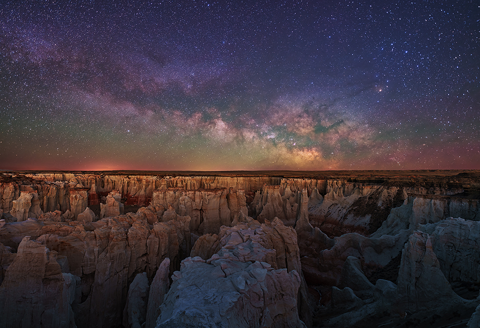 The core of the Milky Way galaxy rises over Coal Mine Canyon. By Robert Shuman