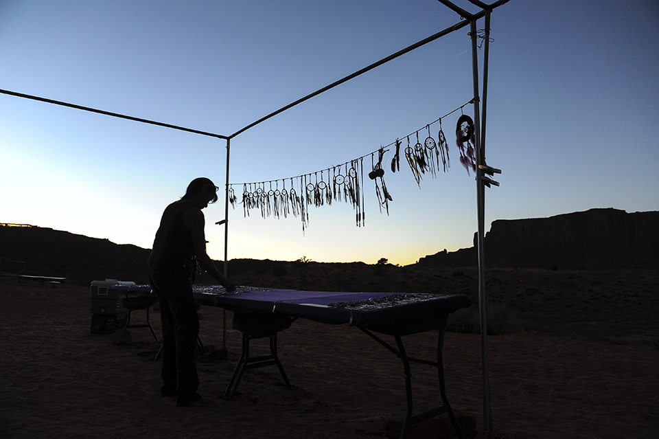 A Native artist produces dreamcatchers by the last light of day. By Marie Baronnet