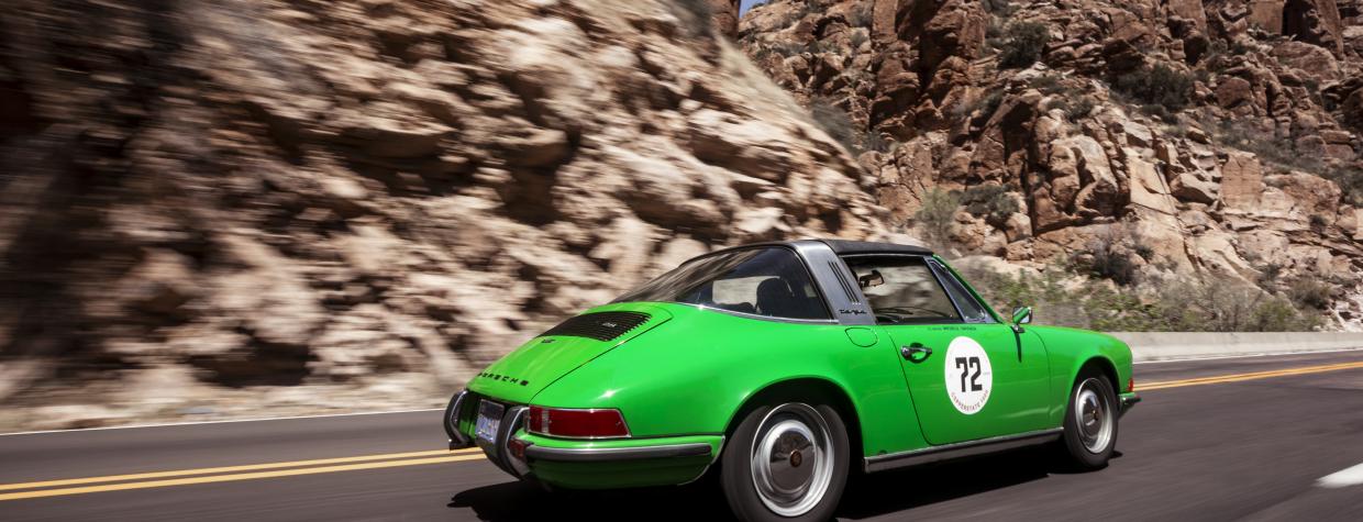 A vintage sports car on an Arizona road. 