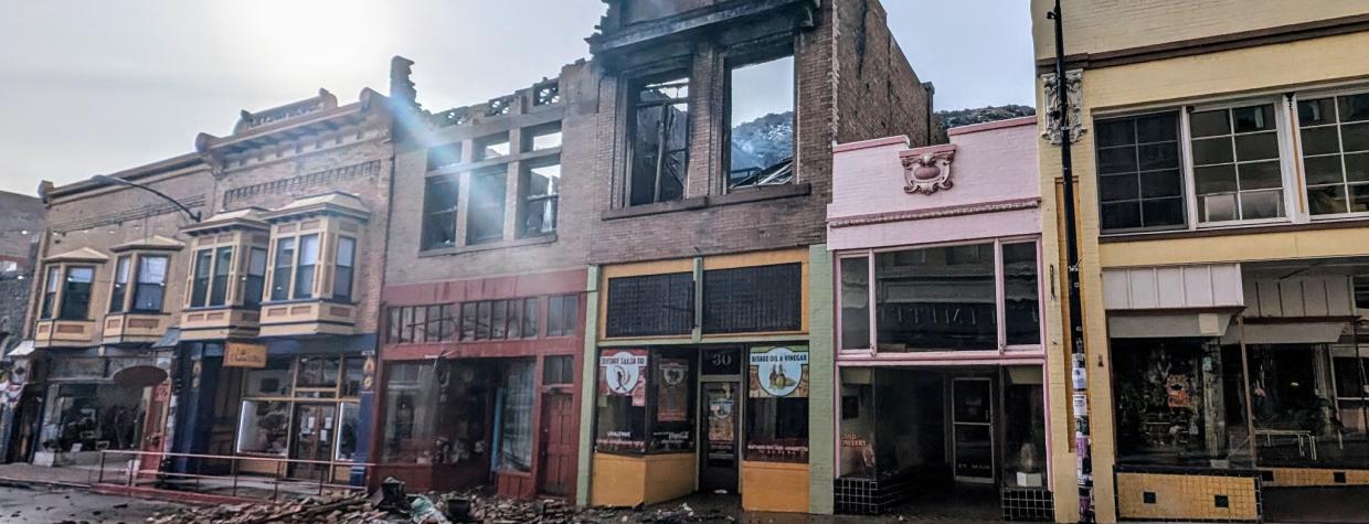 Burned buildings on Tombstone Canyon in Bisbee after a February 2024 fire