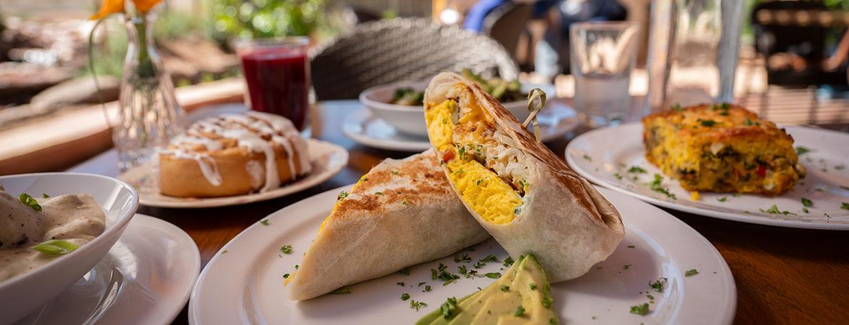 Breakfast at Peach Tree Café, featuring a breakfast burrito with avocado slices. Photo: Dawn Kish