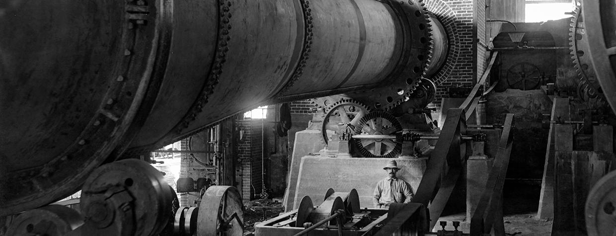 An unidentified man poses in a cement plant at the site of Theodore Roosevelt Dam in a Walter J. Lubken photo from March 1905. The dam was completed six years later, creating Theodore Roosevelt Lake.