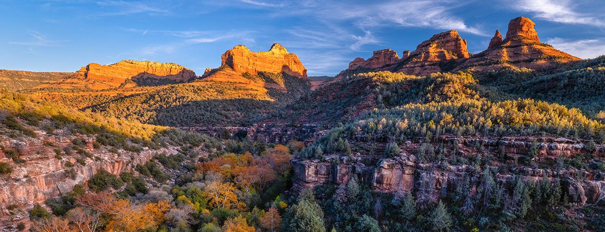  Autumn color mingles with Red Rock Country sandstone in a lower section of Oak Creek Canyon. By Guy Schmickle