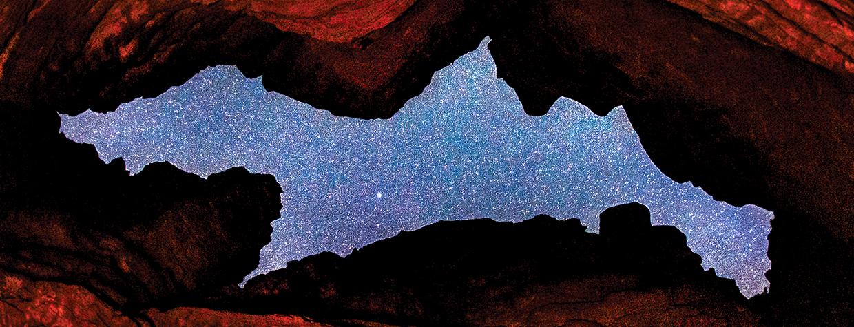 Night sky viewed through narrow walls of a slo canyon along the Colorado River in the GrandCanyon. By Dawn Kish