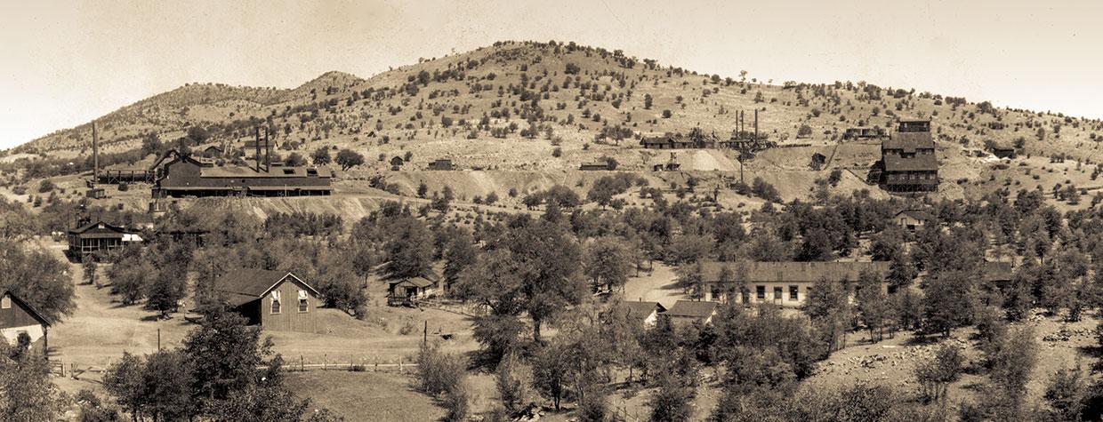 Multiple buildings are visible in this photo from Mowry’s mining heyday. Courtesy of U.S. Geological Survey