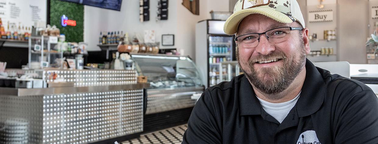 Trevor Glauser pictured at his Gilbert yogurt parfait bar. By Paul Markow