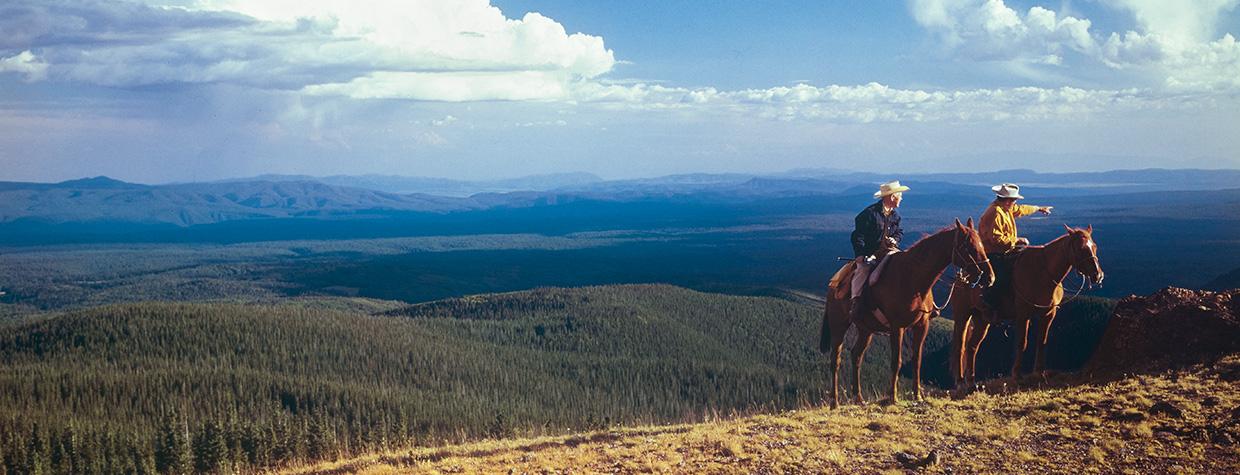wo cowboys enjoy the view from the south ridge of Mount Baldy, the highest point in Eastern Arizona’s White Mountains. This photograph appeared on the cover of Arizona Highways’ June 1977 issue. WAYNE DAVIS