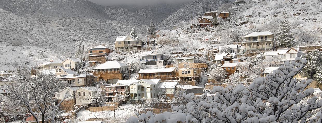 Storm clouds and heavy snow cover Bisbee, Arizona.