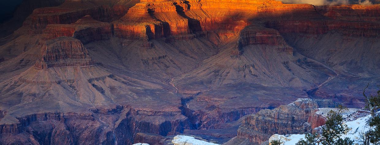 Winter storm clouds clear from the Grand Canyon’s Brahma and Zoroaster temples, two of the gorge’s most recognizable landmarks. This view is from the South Rim’s Yavapai Point, just northwest of the Grand Canyon Visitor Center. By Adam Schallau