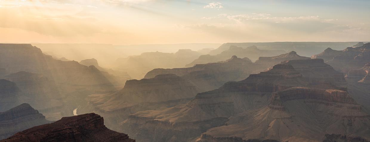 Smoke from the Dragon Bravo Fire creates sunbeams in the Grand Canyon just before sunset. By Matt Soeffner