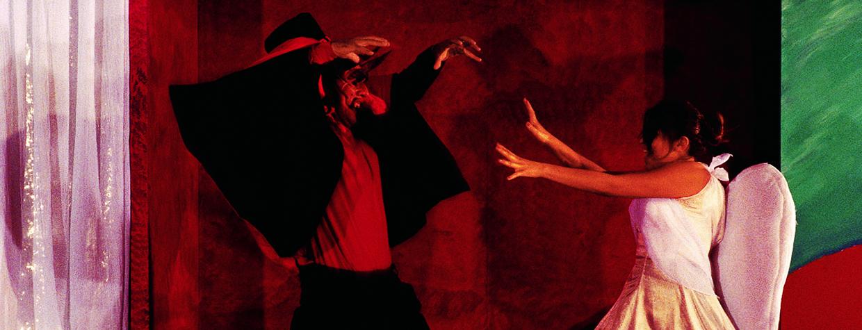 Good triumphs over evil in Guadalupe's humorous morality play La Pastorela. Here, Zarco Guerrero's Satan tangles with the Archangel Michael as portrayed by Rose Villa. | Jeff Kida