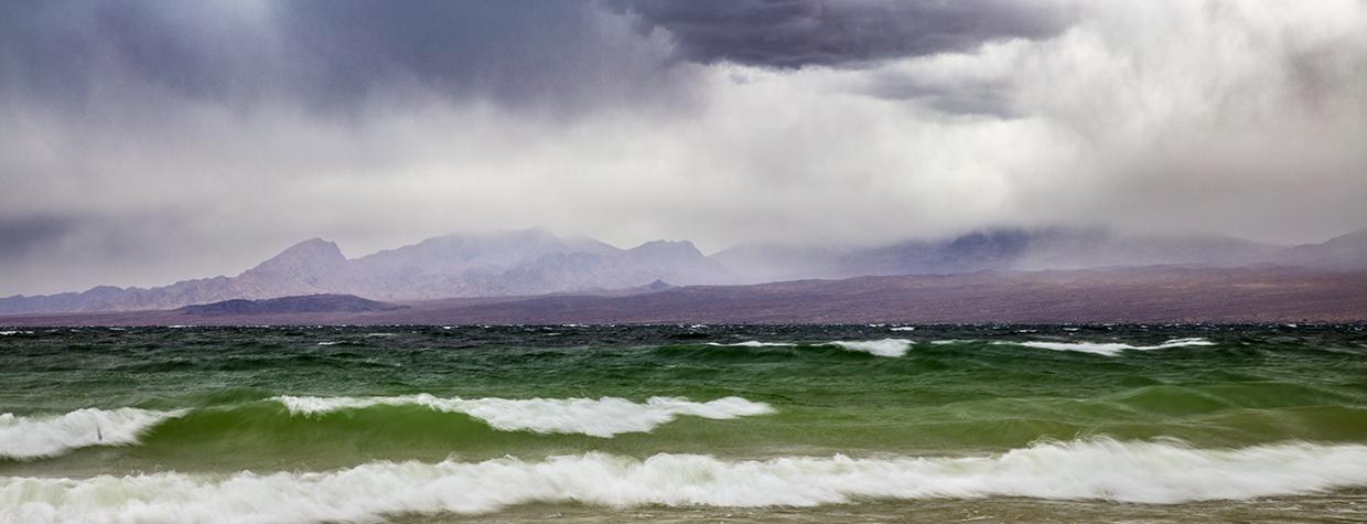 Storm clouds whip up waves on Lake Mohave. By Joel Hazelton