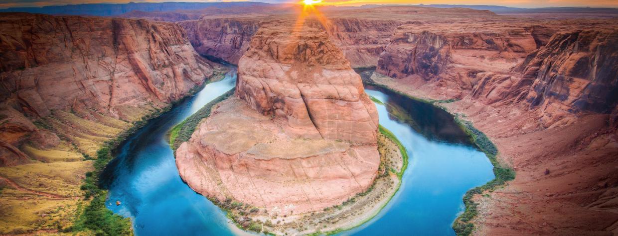 Horseshoe Bend offers an iconic view of the Colorado River near Page at sunset.