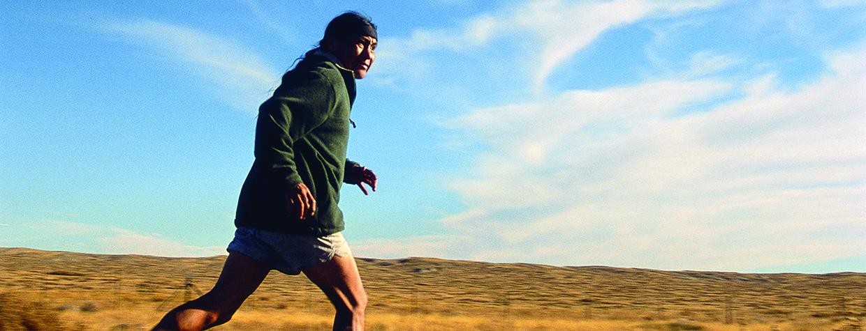 pounding the road  Dale Jackson runs along the road between the Hopi village of Moenkopi and Dilkon, on the Navajo Indian Reservation, during a 100-mile training relay. | Gary Johnson