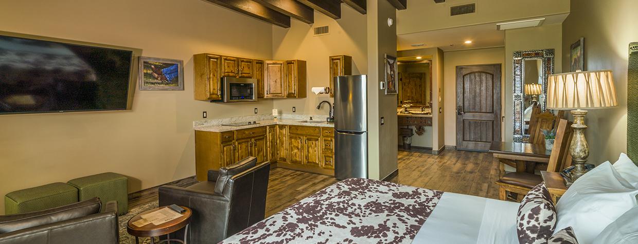 Prickly Pear Inn room interior offers plenty of space, including a kitchenette and beamed ceilings. | Laurence Parent