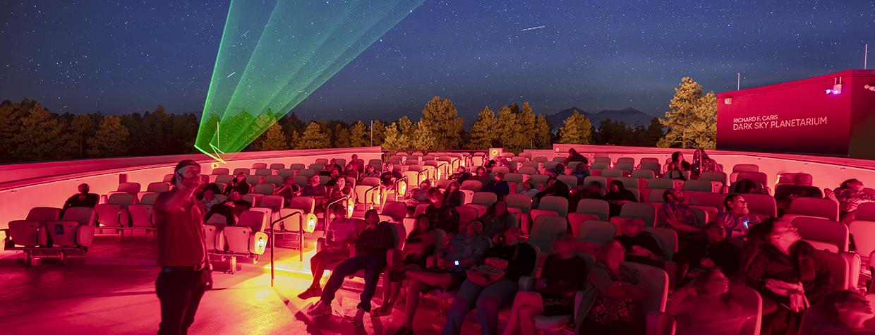 A presenter guides visitors on a tour of the night sky at Lowell Observatory. By Dawn Kish