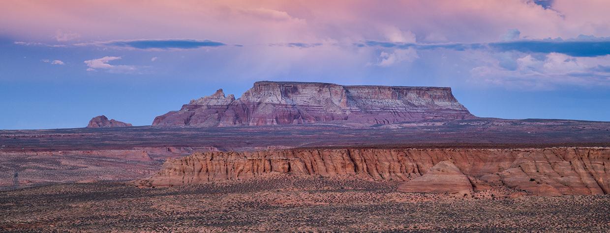 The view east from Navajo Route 20 includes LeChee Rock, shown here at sunset. | Gary Ladd