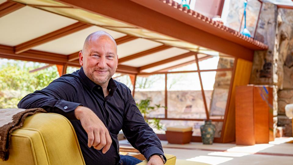 Joseph Specter is pictured in the living room of Frank Lloyd Wright's Taliesin West, in Scottsdale.