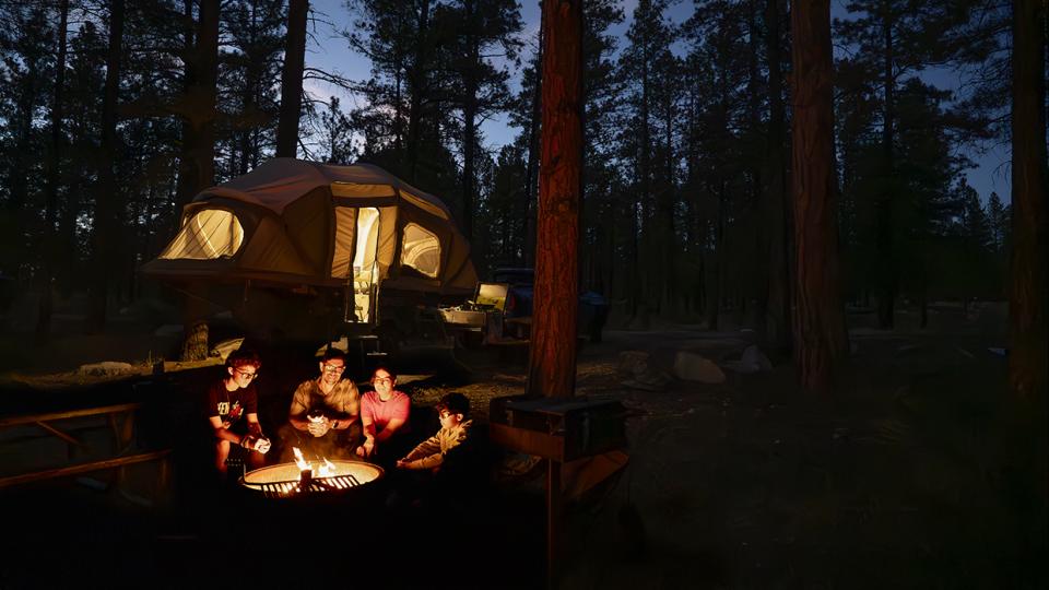 The Villalobos family enjoys the glow from a responsible campfire at Tusayan-Montane campground, near the South Rim of the Grand Canyon. | Dawn Kish