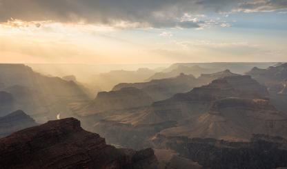 Smoke from the Dragon Bravo Fire creates sunbeams in the Grand Canyon just before sunset. By Matt Soeffner