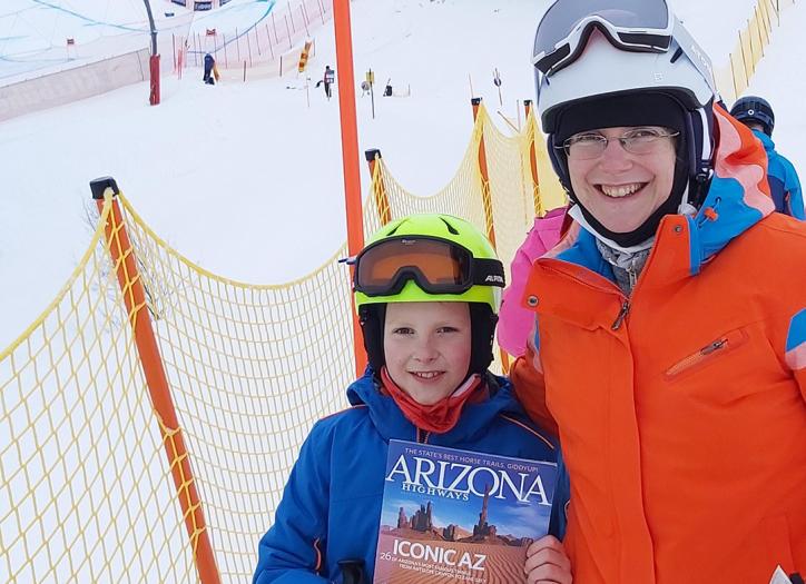 Leo and Isabella next to the Streif, a World Cup downhill ski course in Kitzbuhel, Austria