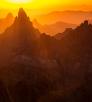 Sunrise in the Kofa Mountains displays layered hues of yellow, orange and brown. By Joel Hazelton