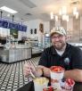 Trevor Glauser pictured at his Gilbert yogurt parfait bar. By Paul Markow