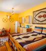 The Nopales Suite (pictured) is a one-bedroom, one-bathroom apartment with a kitchenette and western décor. By Steven Meckler