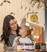 Kassi Rahman, pictured with her daughter, Piper, enjoy one of many flavors of jams. By Paul Markow