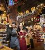 Brad James and Alice Ross pose with stuffed monkeys amid a wonderland of toys and games that is Toyful. By Dawn Kish