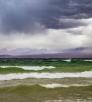 Storm clouds whip up waves on Lake Mohave. By Joel Hazelton