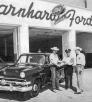 Tex Earnhardt (left) delivers a new 1952 Ford Mainline police car to the Chandler Police Department at the original Earnhardt Ford location in downtown Chandler. | Courtesy of Earnhardt Ford