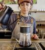 Barista Linnea Renken prepares a pour-over coffee at Peixoto’s Chandler location. | Jill Richards