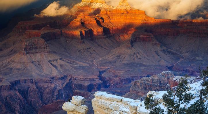Winter storm clouds clear from the Grand Canyon’s Brahma and Zoroaster temples, two of the gorge’s most recognizable landmarks. This view is from the South Rim’s Yavapai Point, just northwest of the Grand Canyon Visitor Center. By Adam Schallau