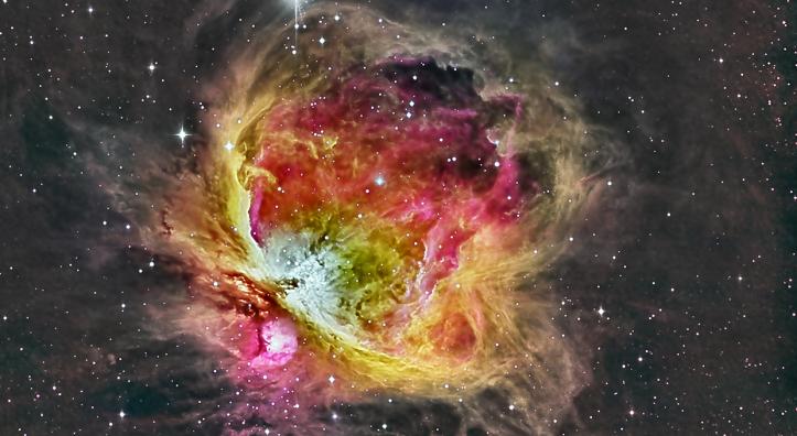 Red and yellow hues feature prominently in this colorful deep space photograph by Ken Naiff.