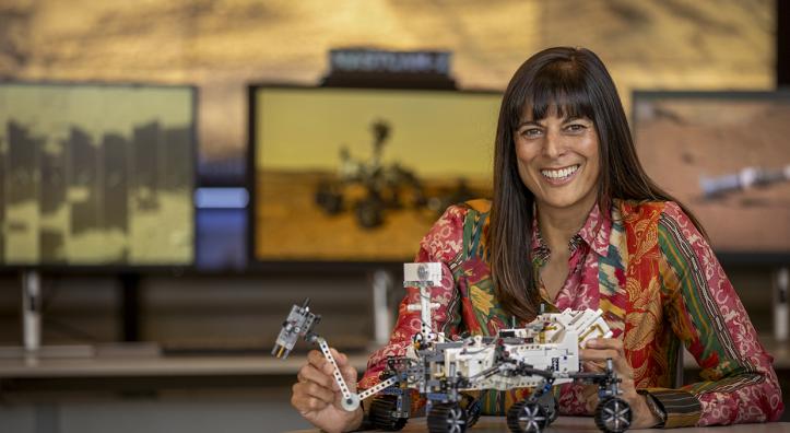 Meenakshi Wadhwa poses with a scaled down model of an extraterrestrial land rover. By Paul Markow