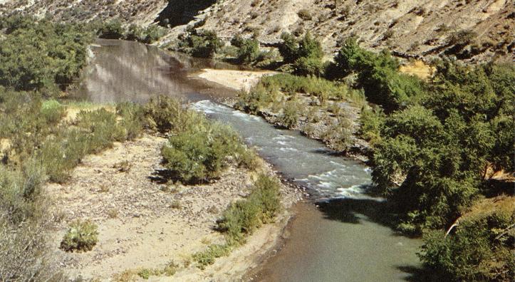 This Allen C. Reed photograph, titled Sun on the River, was one of three color images in our March 1951 story. The caption reads: “This part of the Verde Valley where there are fewer cliffs is typical of the country, which at one time supported a large Indian population living in hilltop pueblos.”